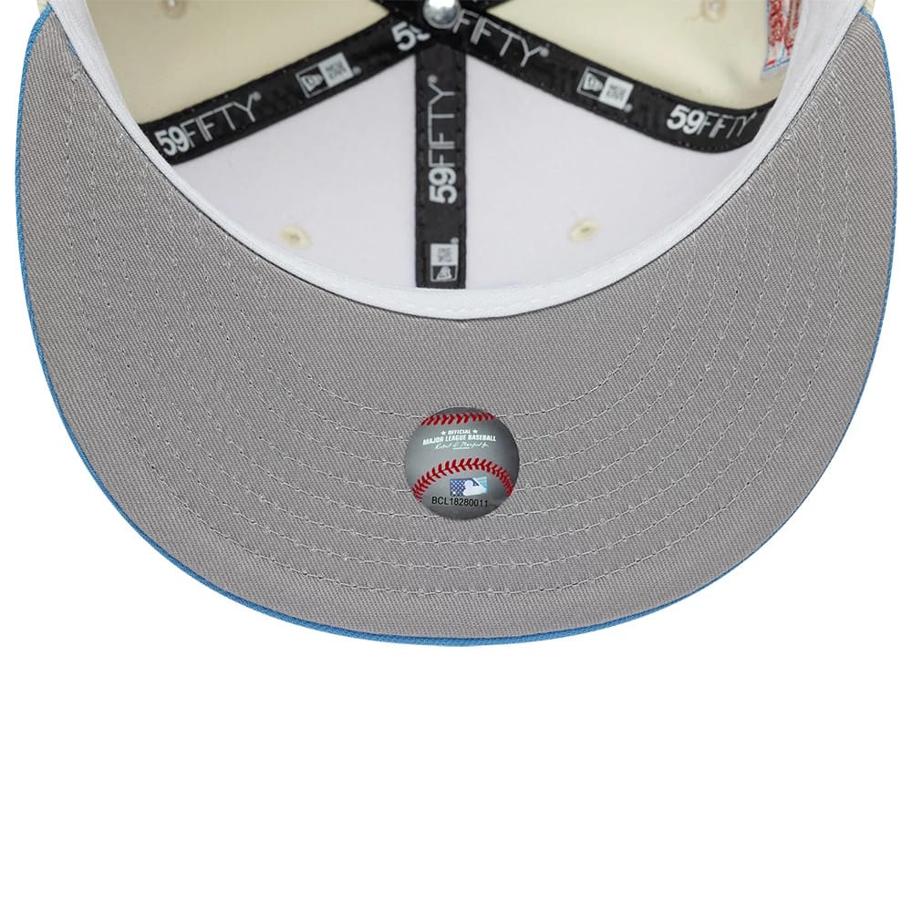Houston Astros MLB Cooperstown Cream New Era 59FIFTY Fitted Cap, inside view showing black 59FIFTY taping, a white sweatband, and a grey undervisor with a holographic size sticker at the centre.