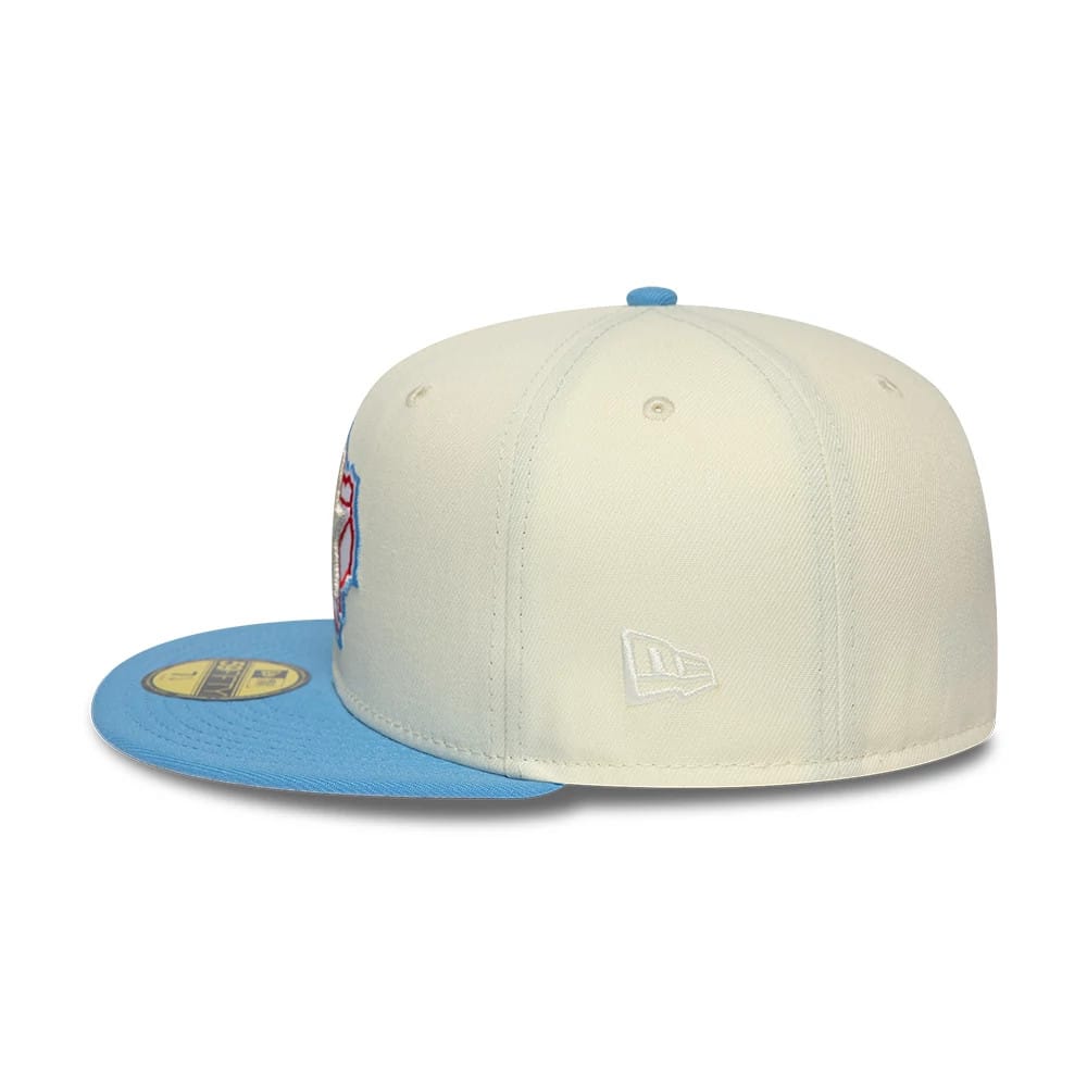 Houston Astros MLB Cooperstown Cream New Era 59FIFTY Fitted Cap, side view showing the white New Era flag logo on the left side of the cream structured crown, with a light blue flat visor featuring a gold 59FIFTY size sticker.