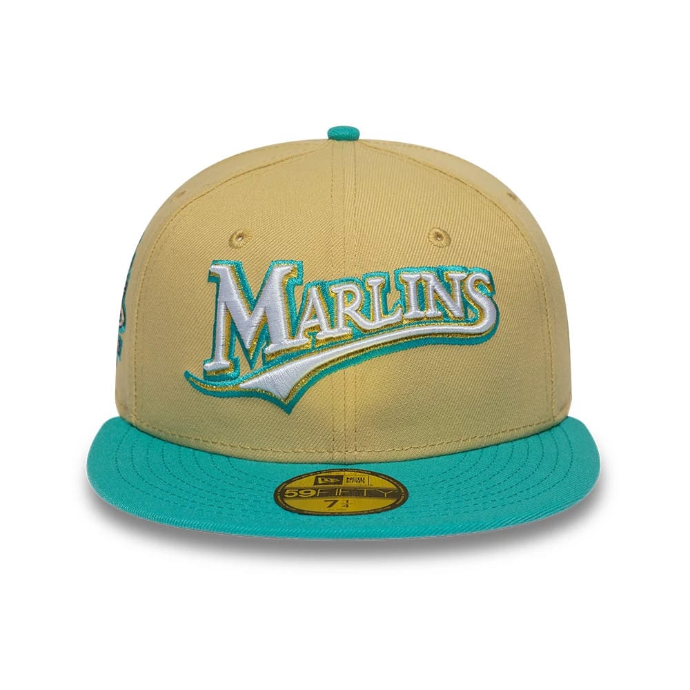 Pictured is this MLB Vegas Gold Florida Marlins 59FIFTY Fitted cap in gold & black. 3