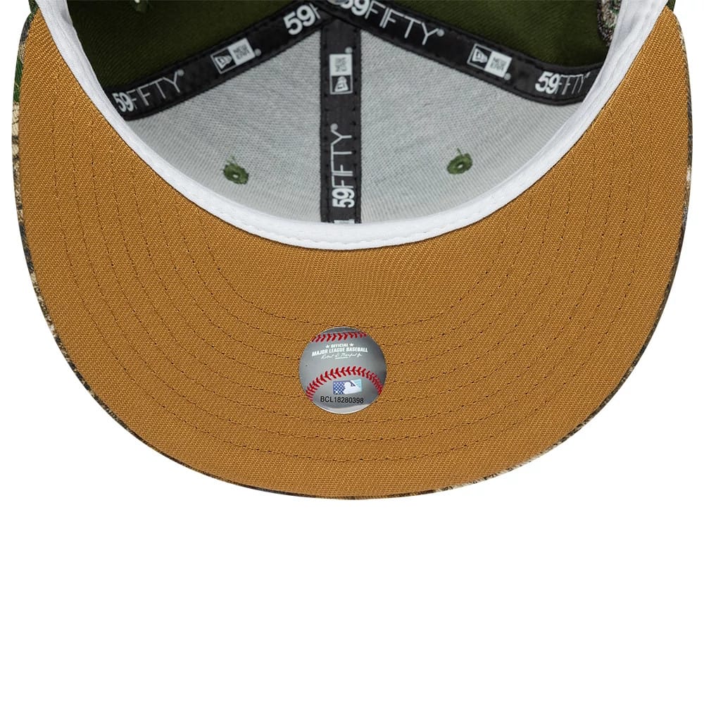 Houston Astros MLB Cooperstown Dark Green New Era 59FIFTY Fitted Cap, inside view showing black taping with 59FIFTY branding, a grey sweatband, a brown undervisor, olive green eyelets, and a baseball-shaped sticker in the centre.