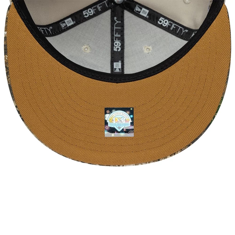 Buffalo Bisons MiLB Hometown Beige New Era 59FIFTY Fitted Cap, inside view showing black 59FIFTY taping along the seams, a grey sweatband, a mustard undervisor, and a round sticker with colourful graphics at the centre.