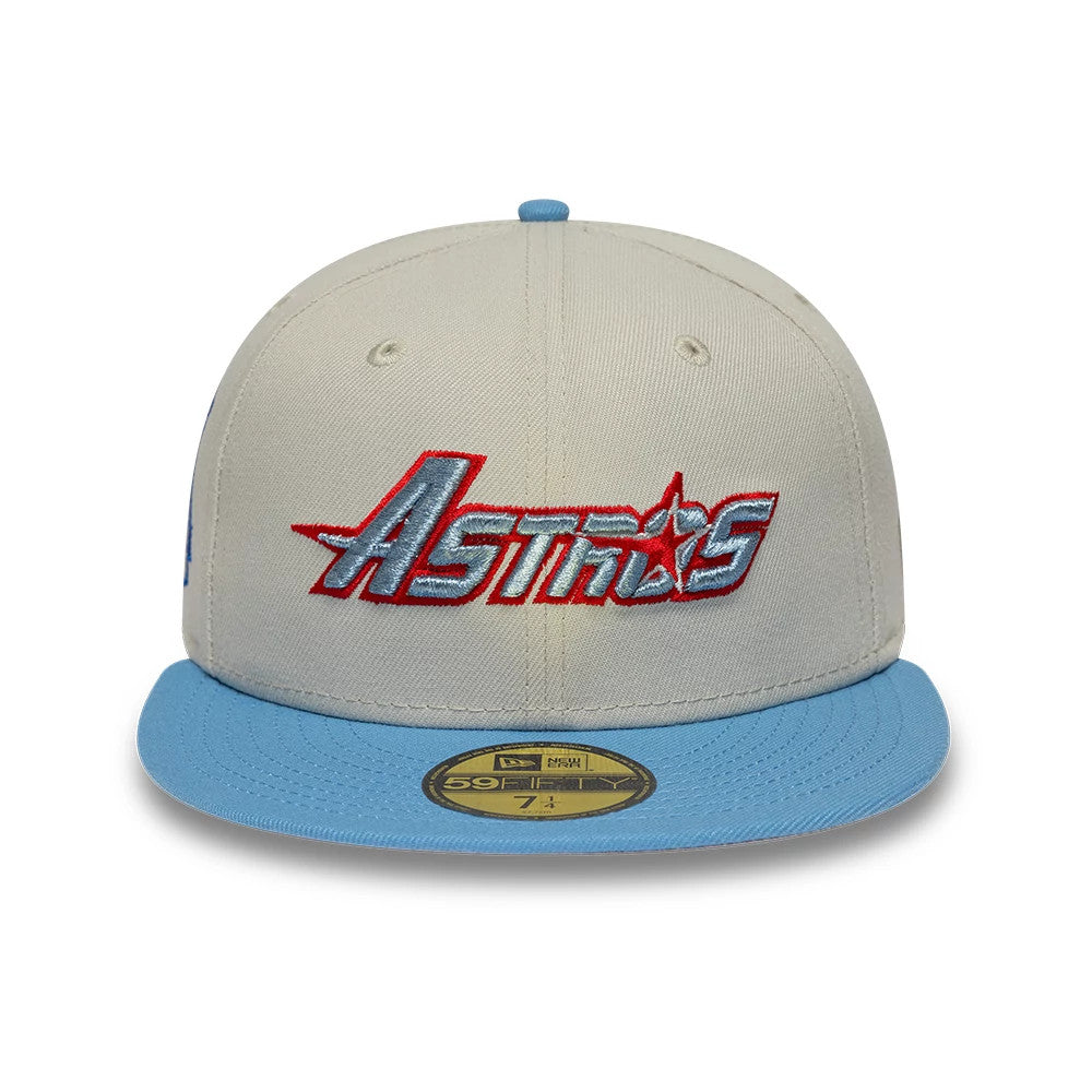 Houston Astros MLB Cooperstown Beige & Blue New Era 59FIFTY Fitted Cap, front view showing a raised Astros logo embroidered in red and blue on the beige front panel, paired with a light blue visor and a gold 59FIFTY size sticker on top.