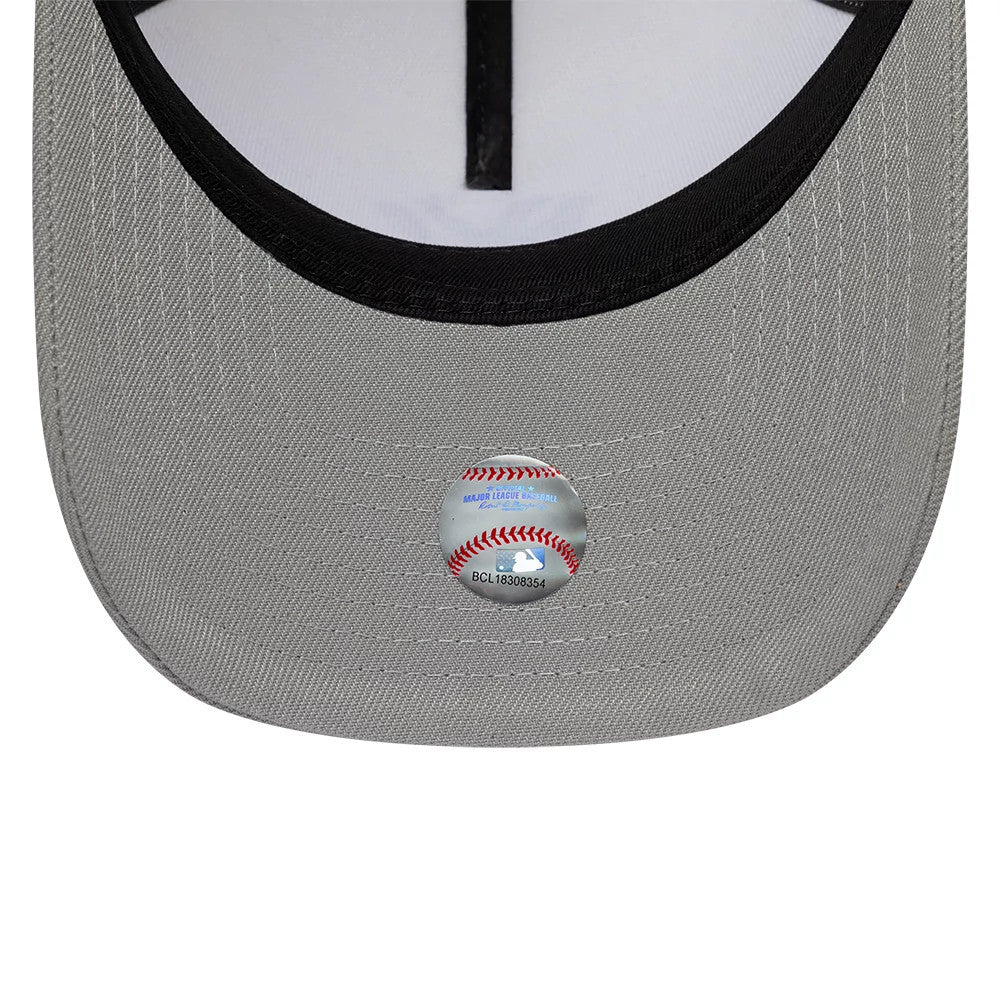 New York Yankees MLB Cooperstown White & Grey New Era 9FORTY A-Frame Cap, inside view showing the grey undervisor with a baseball graphic sticker, black internal tape, and a white sweatband lining the interior edge.