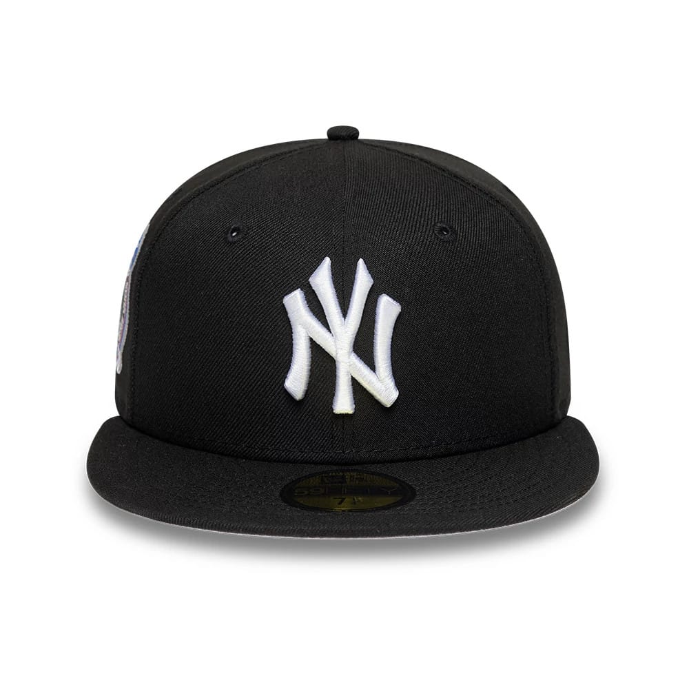 New York Yankees MLB Cooperstown Black New Era 59FIFTY Fitted Cap, front view showing the raised white embroidered NY logo on the front panel, complemented by a flat black visor and a gold 59FIFTY size sticker on the top.