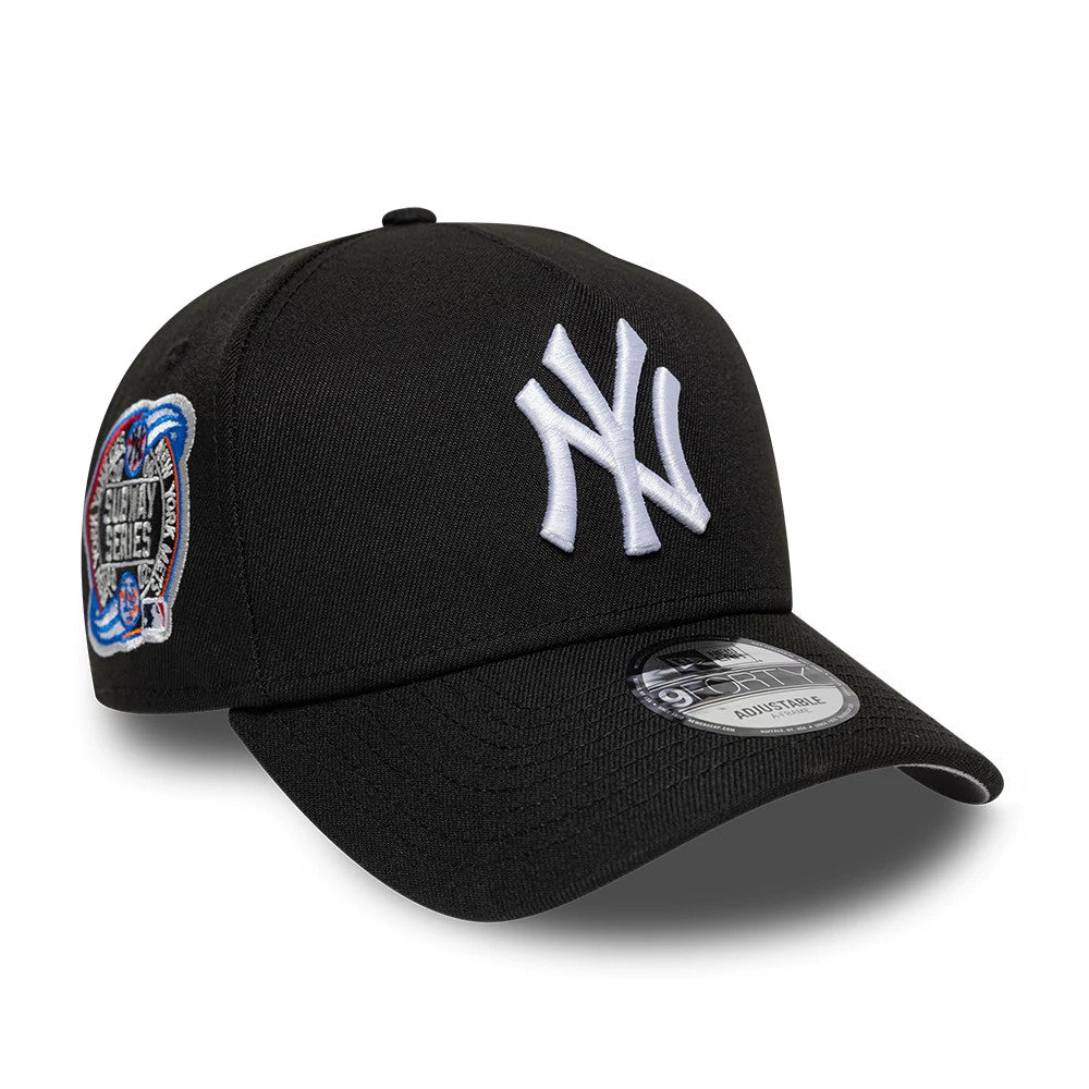 New York Yankees MLB Cooperstown Black New Era 9FORTY A-Frame Cap, three-quarter view showing the white raised embroidery NY logo on the front panel, a woven Side Patch Series logo on the side, and a 9FORTY size sticker on the black curved visor.