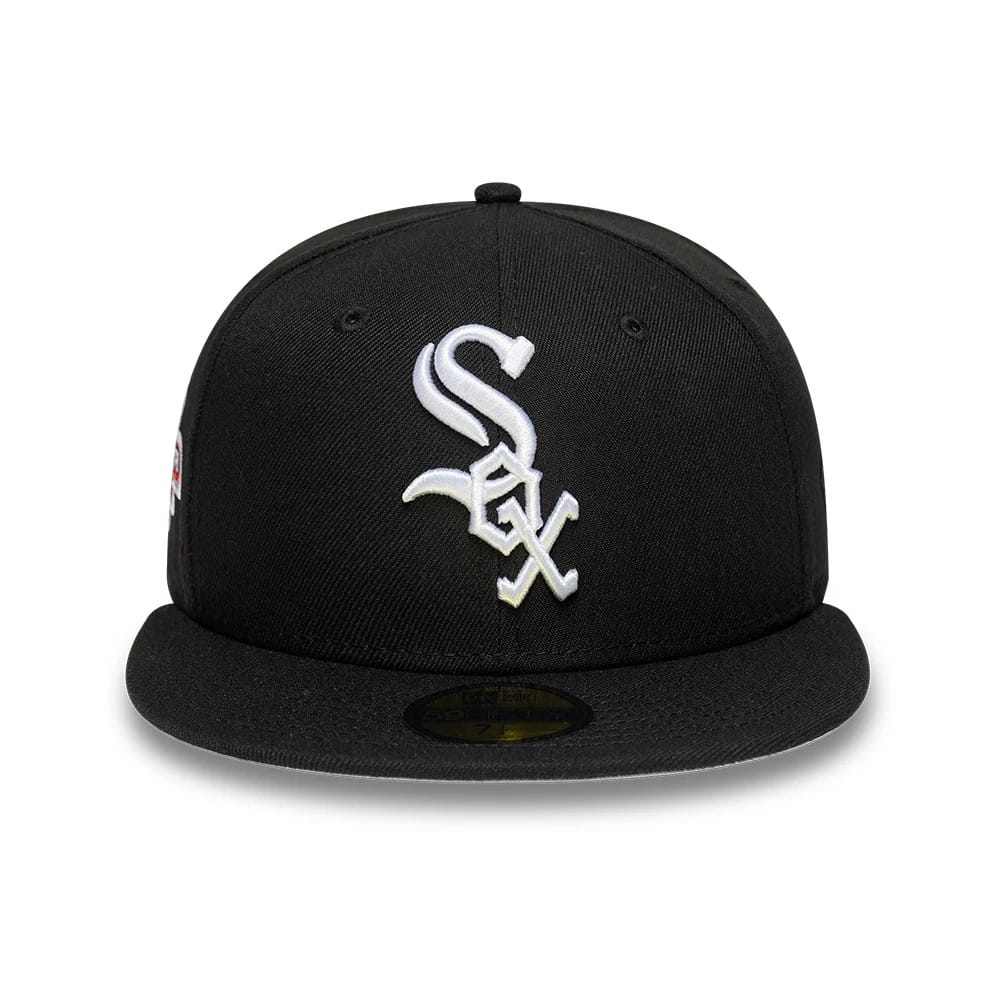Chicago White Sox MLB Cooperstown Black New Era 59FIFTY Fitted Cap, front view showing the white raised embroidered Sox logo on the black structured crown, complemented by the flat black visor with a gold 59FIFTY size sticker underneath.