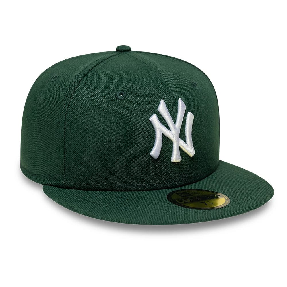 New York Yankees MLB Core Dark Green New Era 59FIFTY Fitted Cap, front view showing a prominent white embroidered NY logo on the structured dark green crown, with a dark green flat visor and a gold 59FIFTY size sticker on the visor.