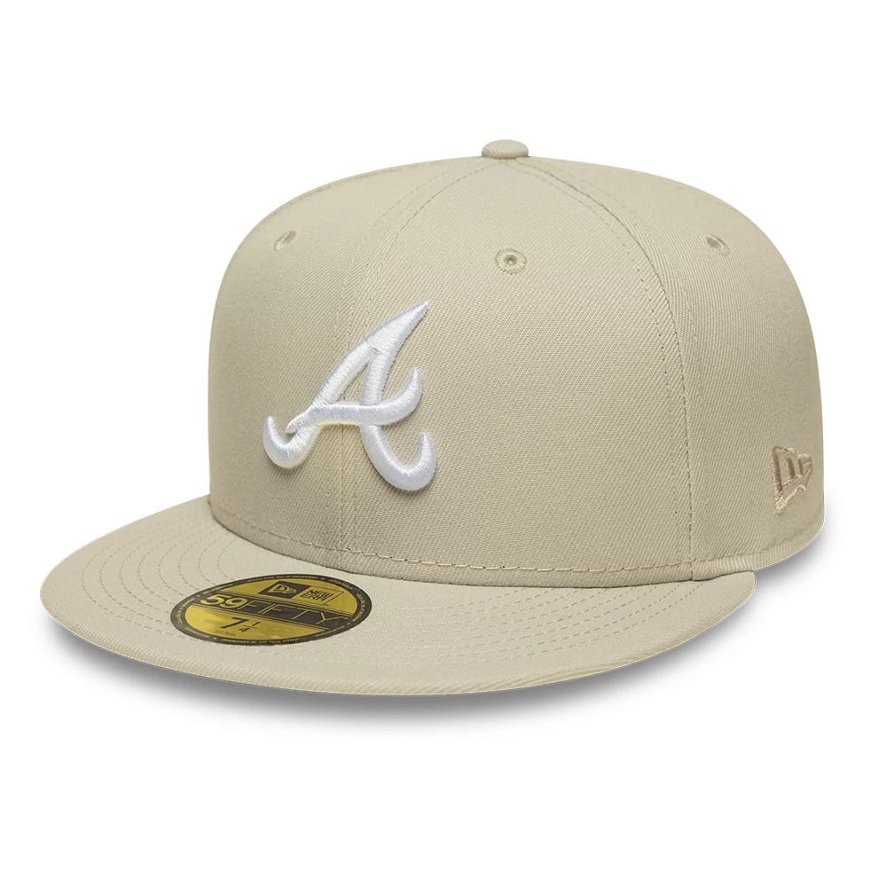 Atlanta Braves MLB Cream New Era 59FIFTY Fitted Cap, front view showing the raised white embroidered A logo on the front panel, a matching cream flat visor with a gold 59FIFTY size sticker, and the New Era flag logo on the left side.