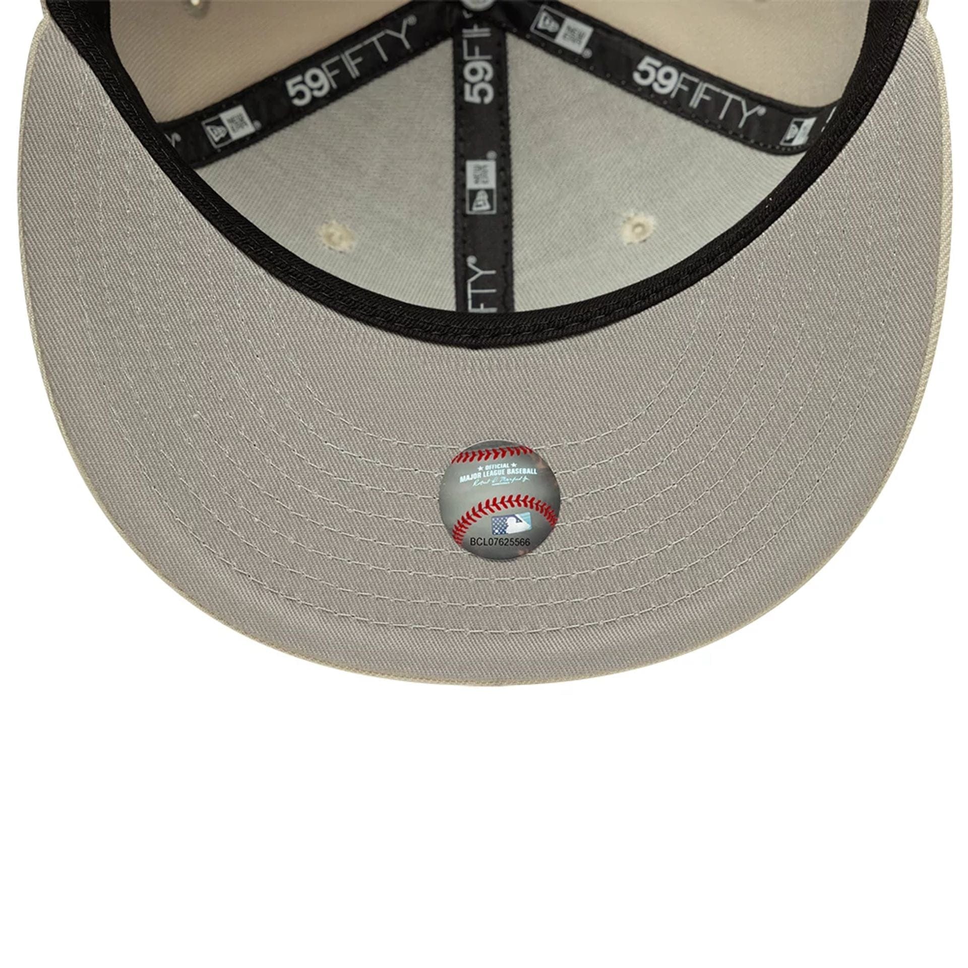 Pictured is this MLB Atlanta Braves 59FIFTY Fitted cap in beige. 2