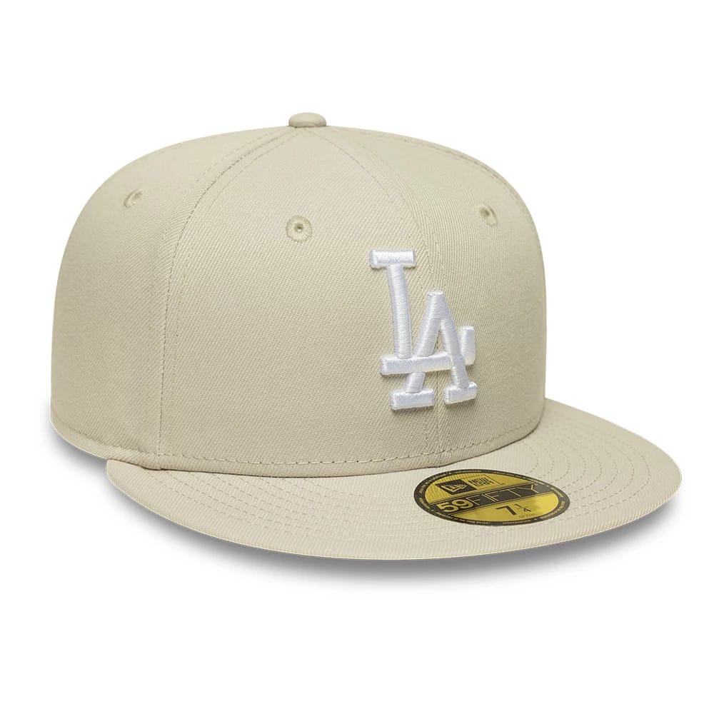LA Dodgers MLB Beige New Era 59FIFTY Fitted Cap, front view showing the raised white embroidered LA logo on the structured beige crown, complemented by a matching flat visor and a gold 59FIFTY size sticker on the visor.