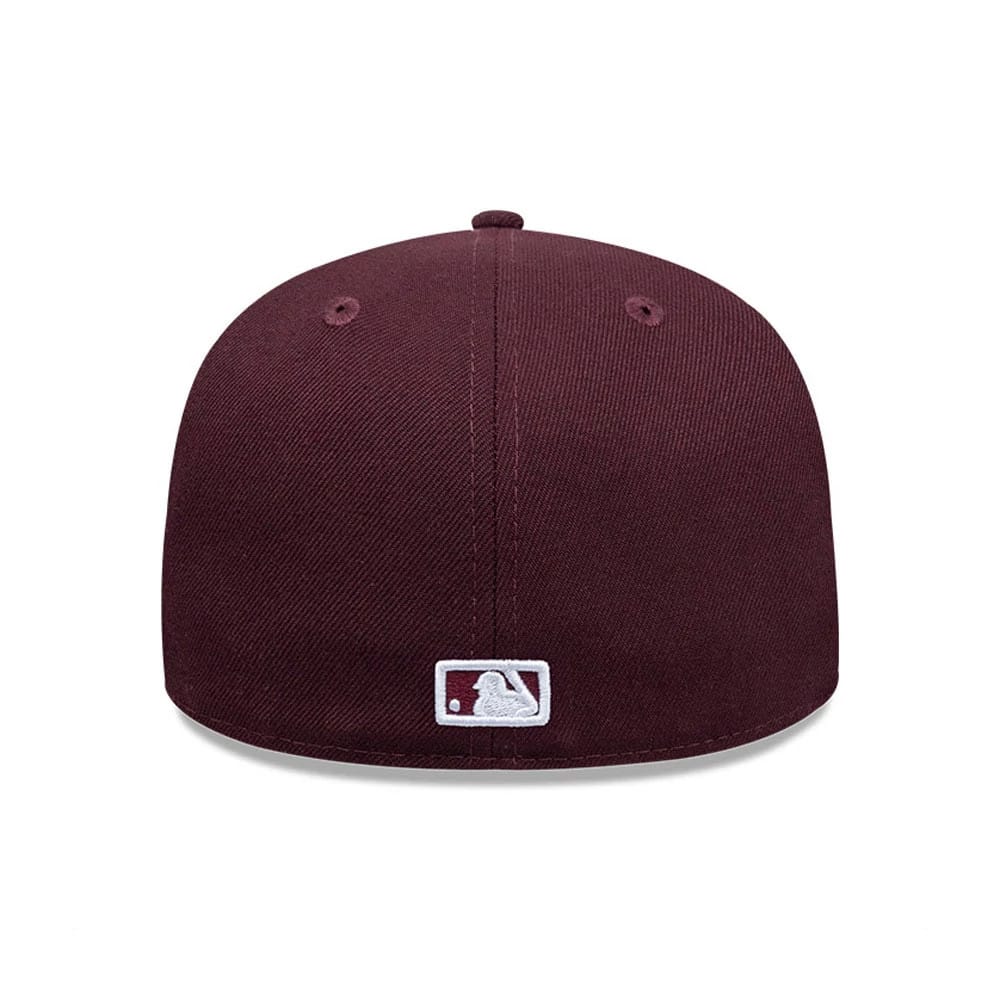 LA Dodgers MLB Dark Purple New Era 59FIFTY Fitted Cap, rear view showing the white embroidered MLB Batterman logo centrally positioned at the bottom of the deep purple structured crown, with matching dark purple eyelets and top button.