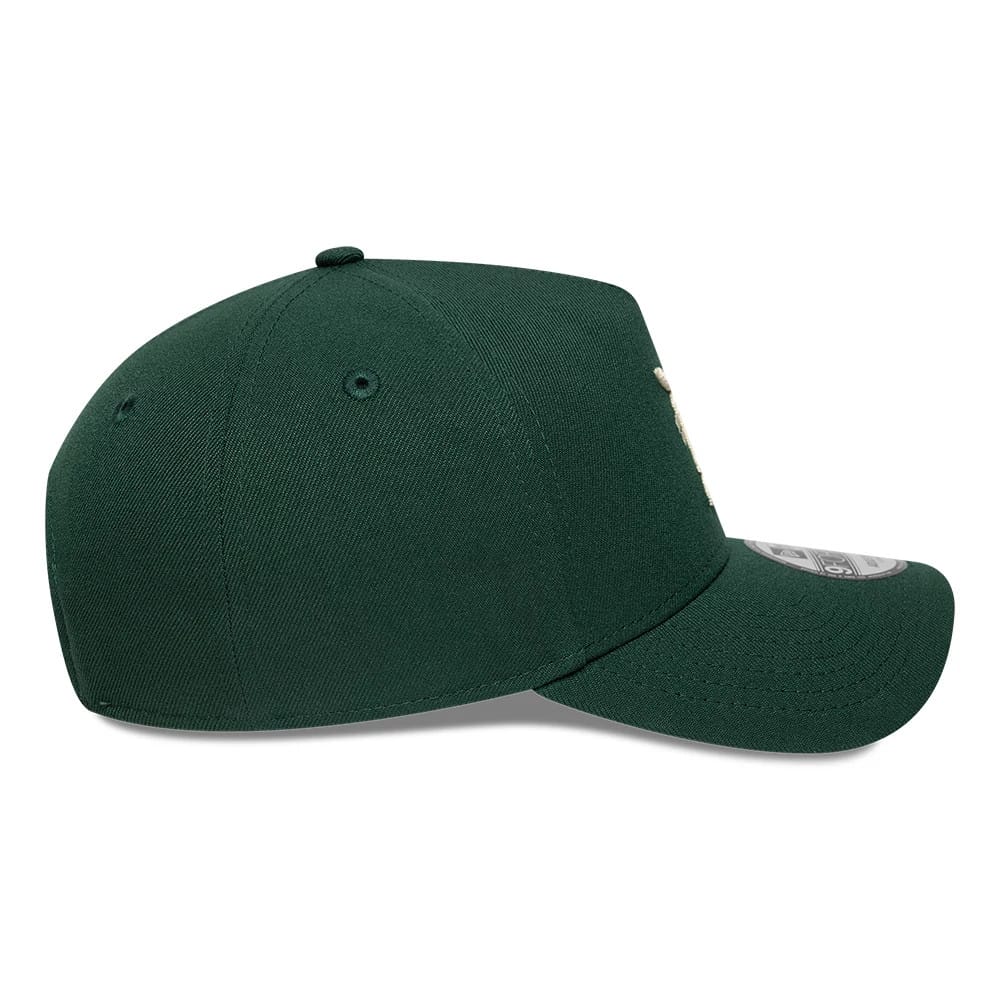 Detroit Tigers MLB Dark Green New Era 9FORTY A-Frame Adjustable Cap, side view showing the structured dark green crown with eyelets, the embroidered logo partially on the front panel, and a curved visor with a 9FORTY size sticker.