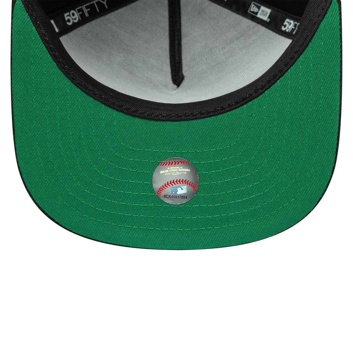 New York Yankees MLB Flat Black New Era 59FIFTY A-Frame Fitted Cap, inside view showing the green undervisor with detailed black stitching, grey sweatband and black taping, and an official MLB Baseball sticker centred underneath.