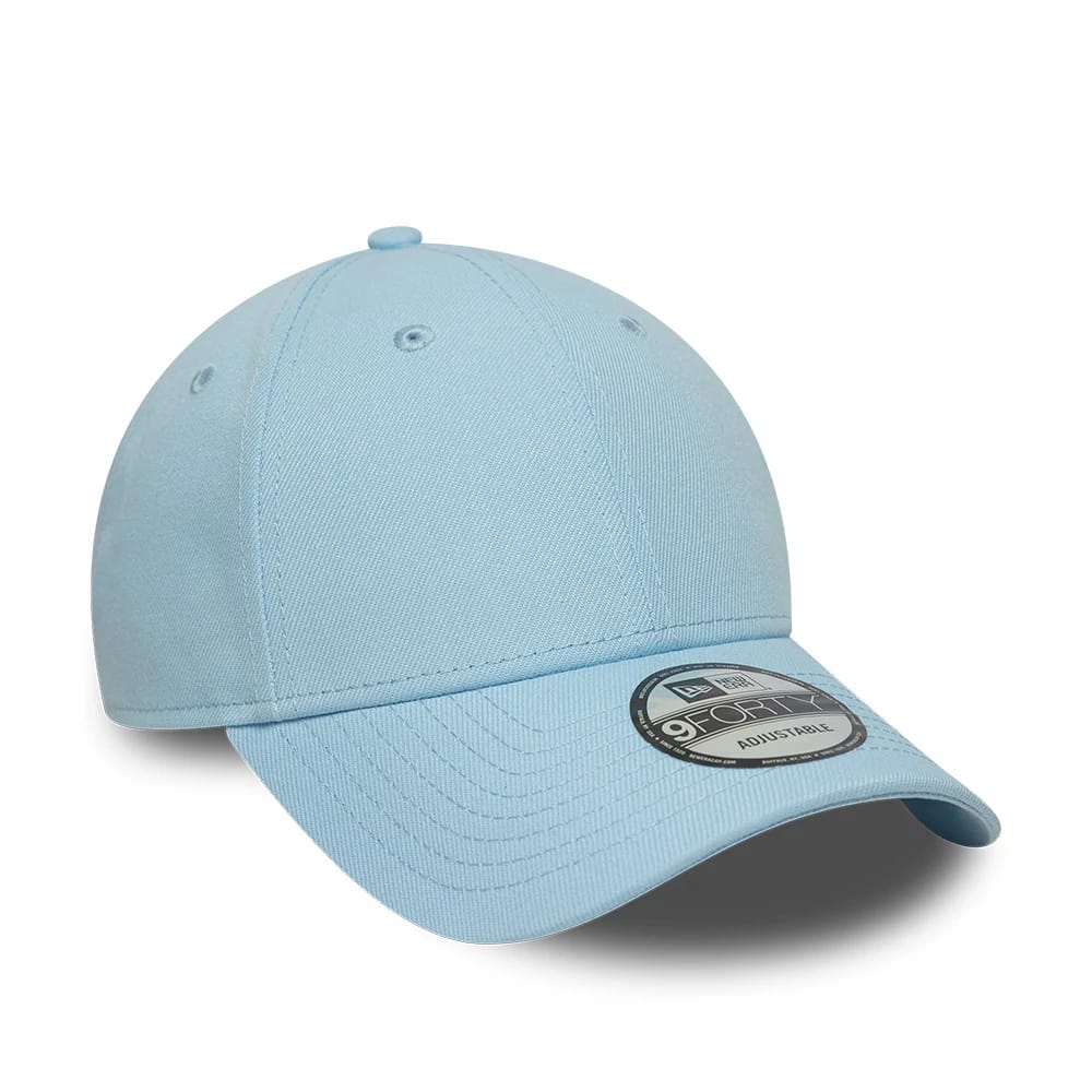 New Era Blue 9FORTY Adjustable Cap, three-quarter view with embroidered eyelets on each panel, a matching blue top button, and a black and silver 9FORTY size sticker on the slightly curved visor.