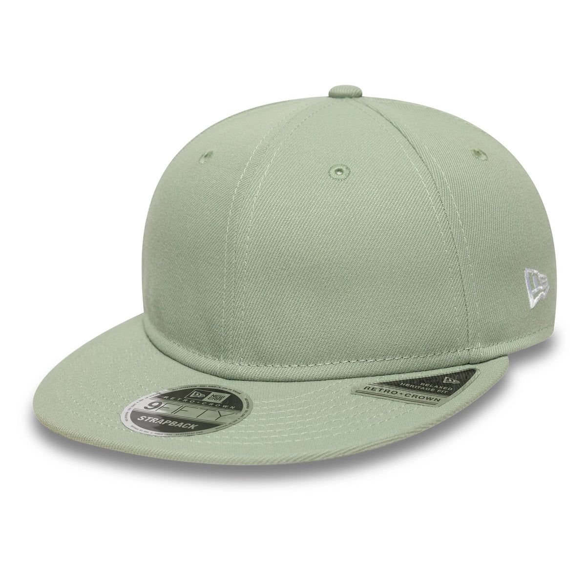 New Era Green Retro Crown 9FIFTY Snapback Adjustable Cap, three-quarter view showing the white embroidered New Era flag logo on the left side, structured green crown with matching eyelets, and grey 9FIFTY size sticker on the flat visor.