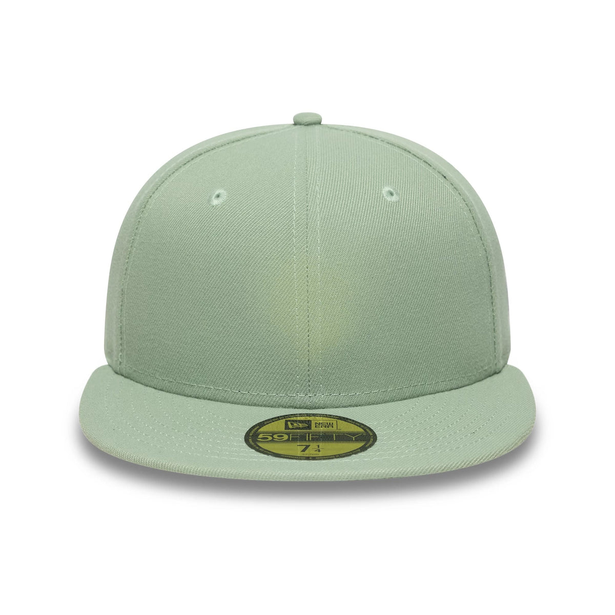 New Era Green 59FIFTY Fitted Cap, front view showing light green structured crown with matching flat visor and gold 59FIFTY size sticker, featuring embroidered eyelets and top button enhancing the cap’s clean and minimalistic look.