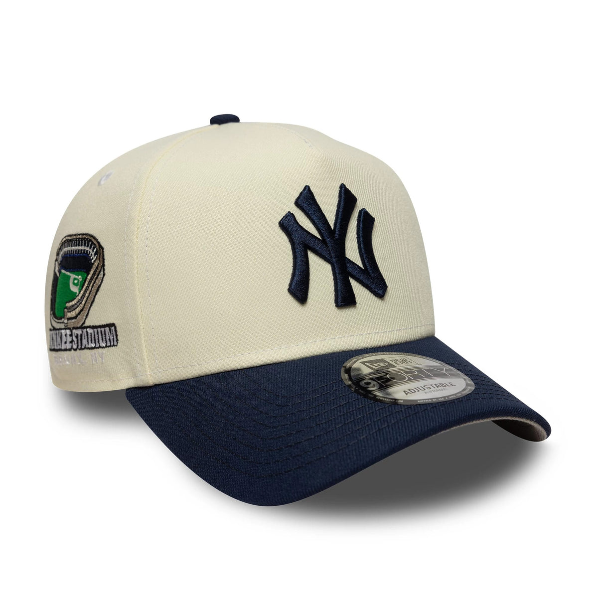 New York Yankees MLB Chrome Blue Contrast Cream New Era 9FORTY A-Frame Adjustable Cap, front view showing the raised navy NY logo embroidered on the cream front panel, a contrasting navy curved visor with a 9FORTY size sticker.