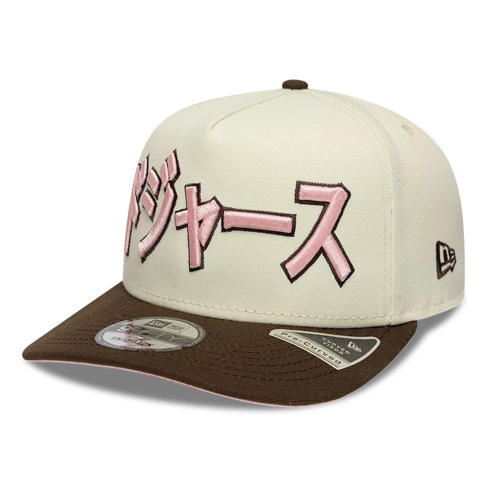 Pictured is this MLB Kanji LA Dodgers 9FIFTY A-Frame Snapback Adjustable cap in cream and brown. 1