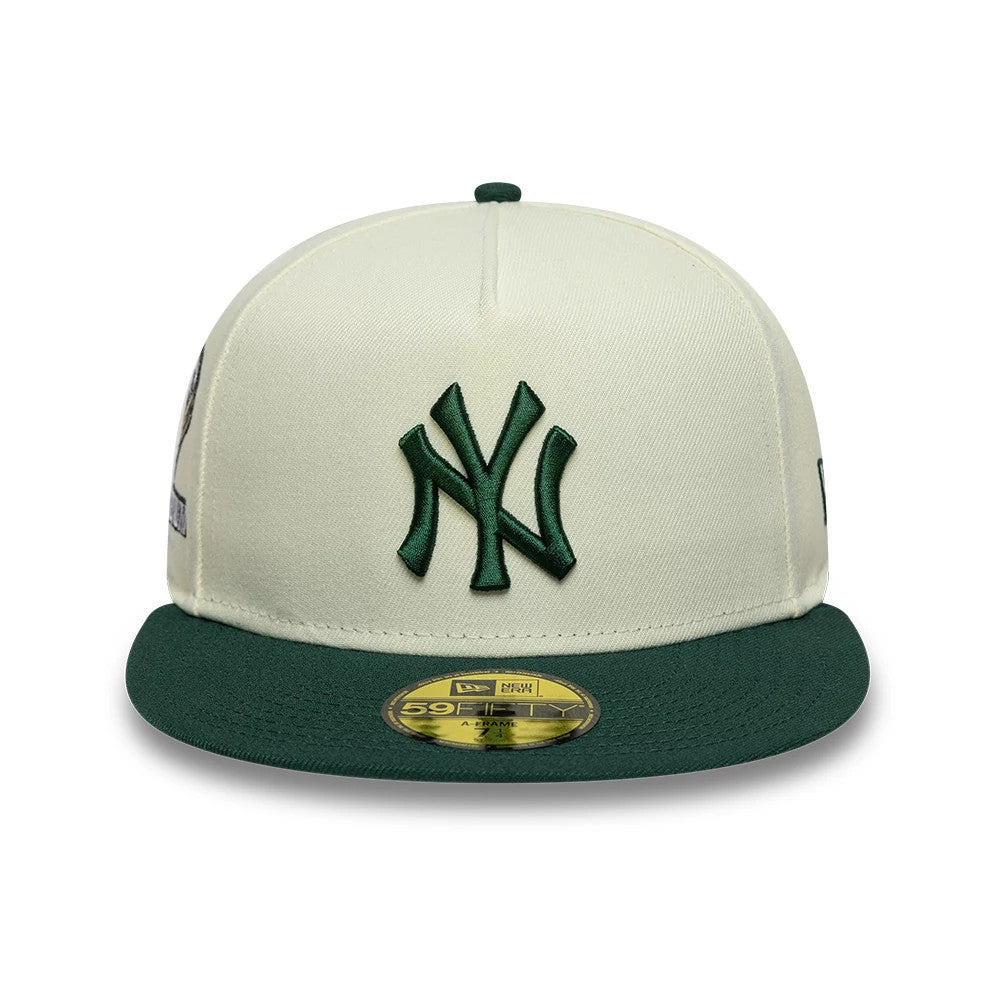 New York Yankees MLB Cream New Era 59FIFTY A-Frame Fitted Cap, front view showing the dark green raised embroidered NY logo on the cream front panel, a matching green flat visor, and a gold 59FIFTY size sticker on the visor.
