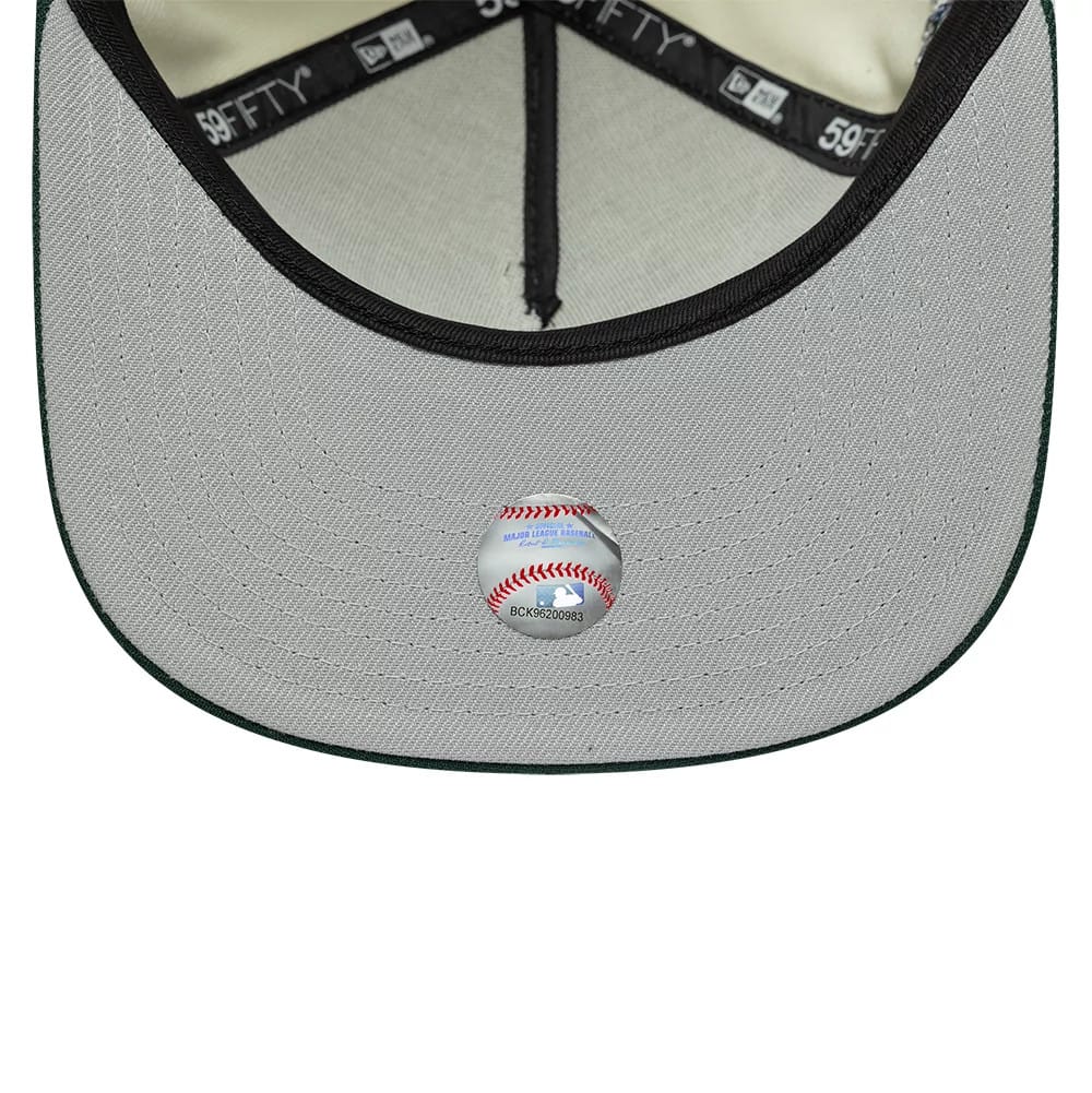 LA Dodgers MLB Cream New Era 59FIFTY A-Frame Fitted Cap, inside view showing black branded taping on the crown seams, a grey undervisor with a Major League Baseball holographic sticker in the centre, and a beige sweatband.