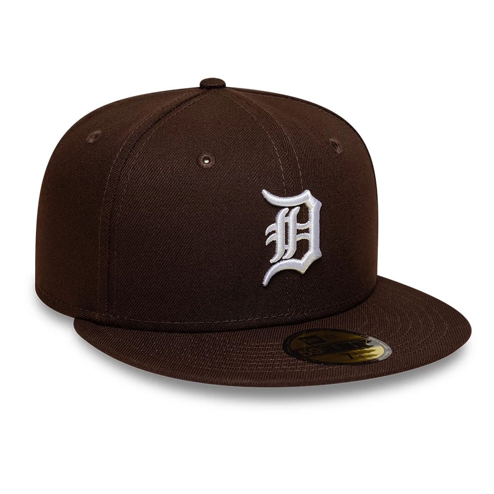Detroit Tigers MLB Dark Brown New Era 59FIFTY Fitted Cap, front view showing a raised white embroidered D logo on the structured dark brown crown, with a matching flat visor and a gold 59FIFTY size sticker on the top.