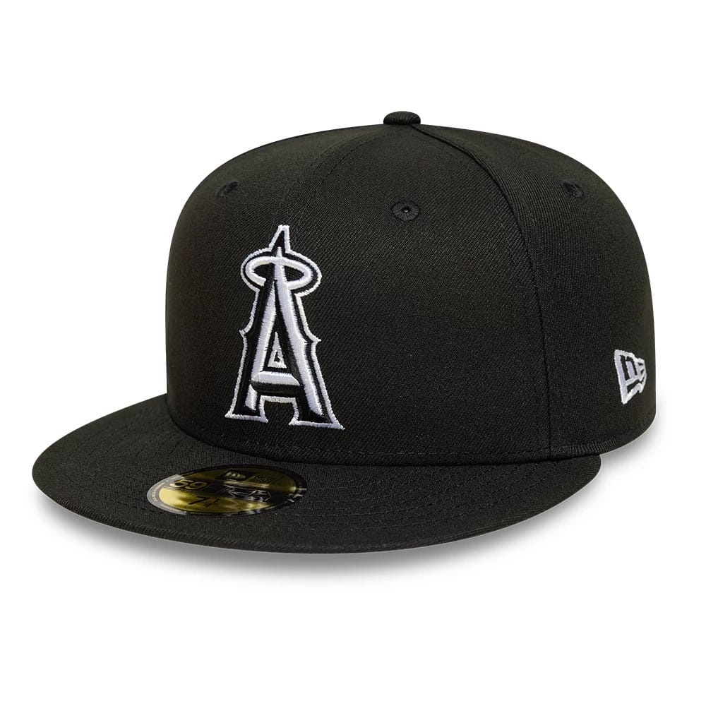 LA Angels MLB Black New Era 59FIFTY Fitted Cap, three-quarter view showing the raised white embroidered LA logo on the front panel, a flat black visor with a gold 59FIFTY size sticker, and the New Era flag logo on the left side.