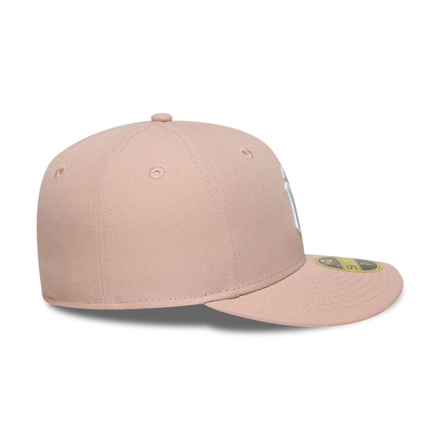 New York Yankees MLB Pastel Pink New Era Low Profile 59FIFTY Fitted Cap, side view showing the pastel pink structured crown, matching curved visor with a gold 59FIFTY size sticker, and New Era flag logo embroidered on the left side.