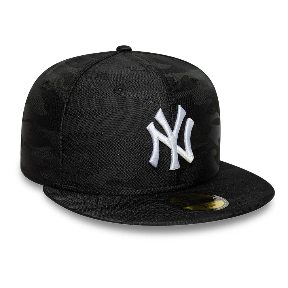 New York Yankees MLB Black Camo New Era 59FIFTY Fitted Cap, three-quarter view showing the white raised embroidered NY logo on the front panel, the black camo pattern on the structured crown, and the gold 59FIFTY size sticker on the flat black visor.