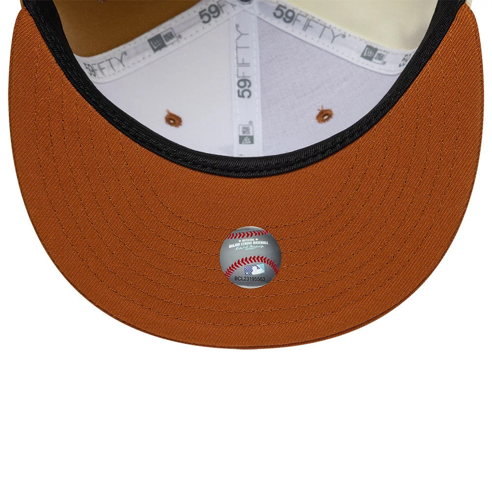Chicago White Sox MLB Contrast White New Era 59FIFTY Fitted Cap, inside view showing the white sweatband and printed New Era 59FIFTY taping, with an orange undervisor adorned with a clear MLB holographic sticker in the centre.