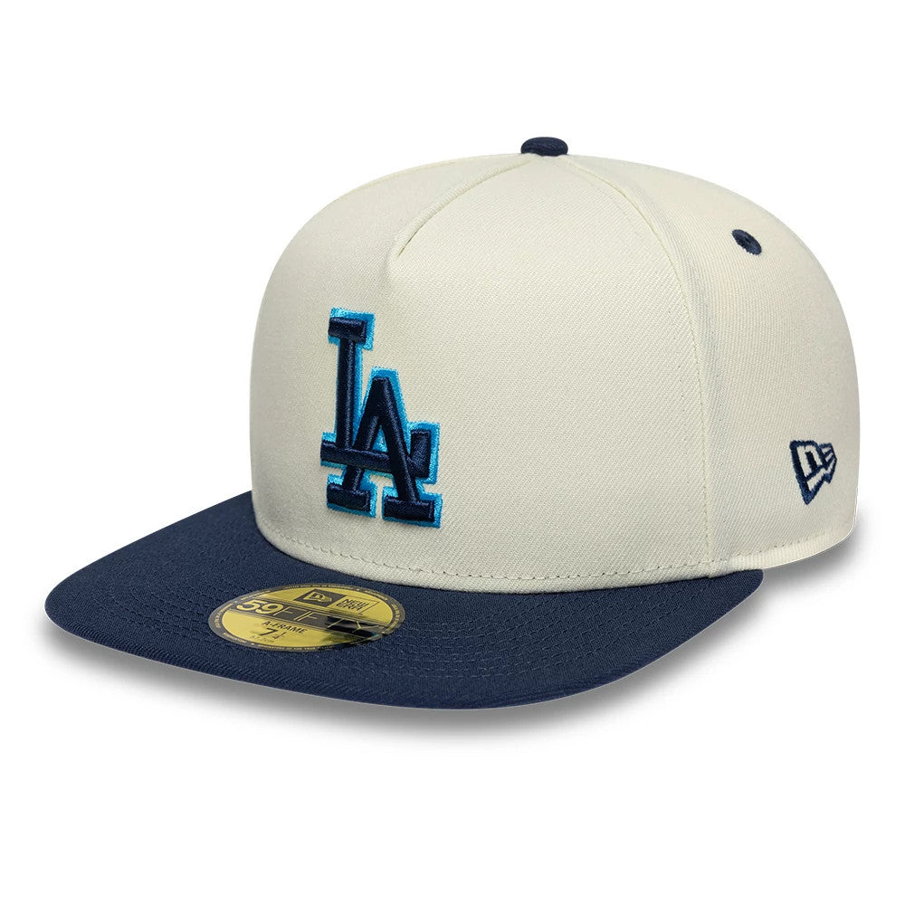 LA Dodgers MLB White New Era 59FIFTY A-Frame Fitted Cap, three-quarter view showing the blue LA logo with a light blue outline embroidered on the front panel, a navy visor with a gold 59FIFTY size sticker, and the New Era flag logo on the left side.