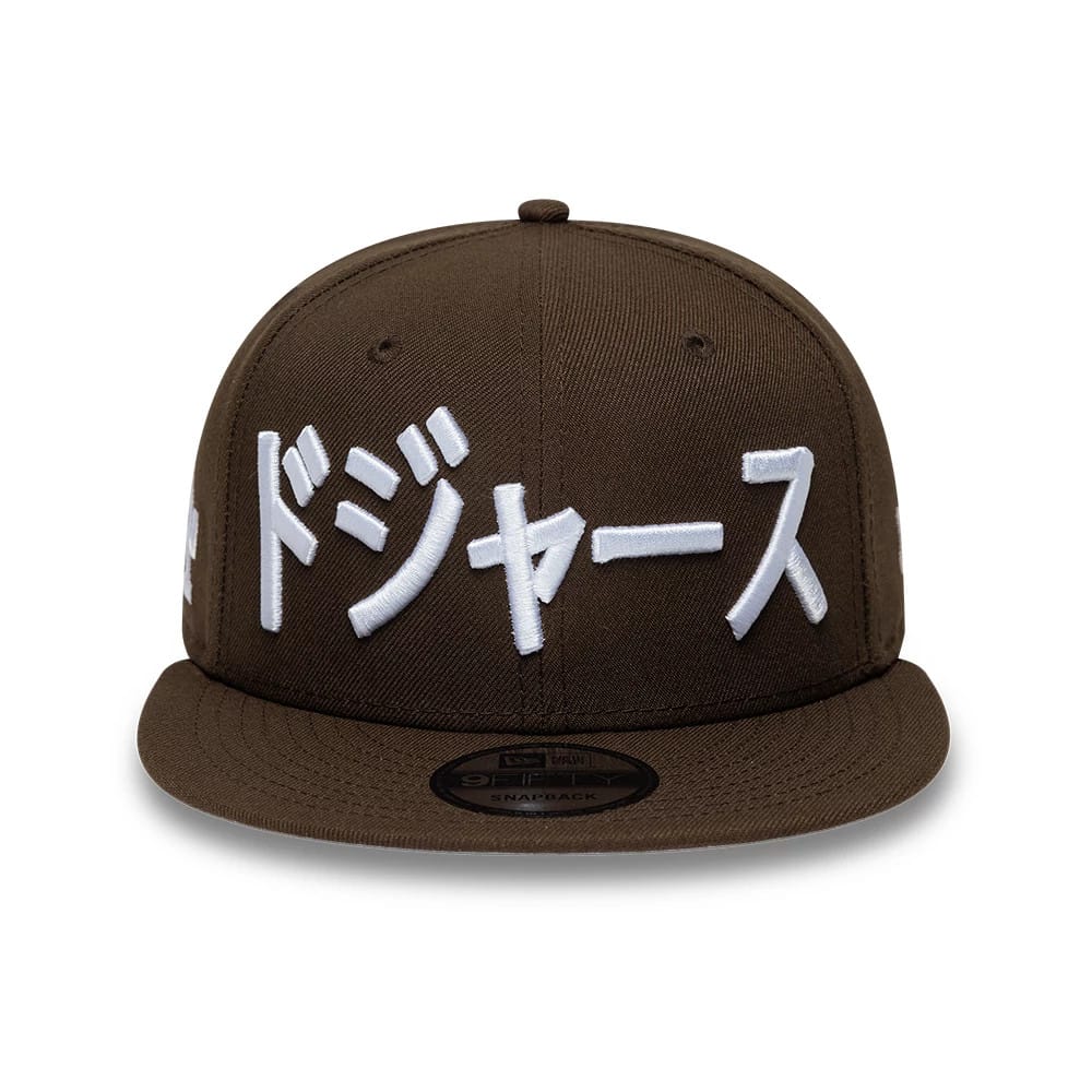 Pictured is this MLB Kanji LA Dodgers 9FIFTY Snapback Adjustable cap in dark brown. 3