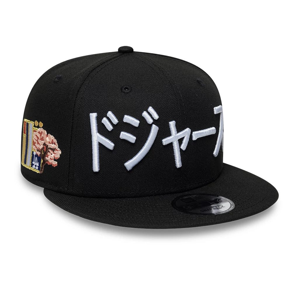 Pictured is this MLB Kanji LA Dodgers 9FIFTY Snapback Adjustable cap in black. 1