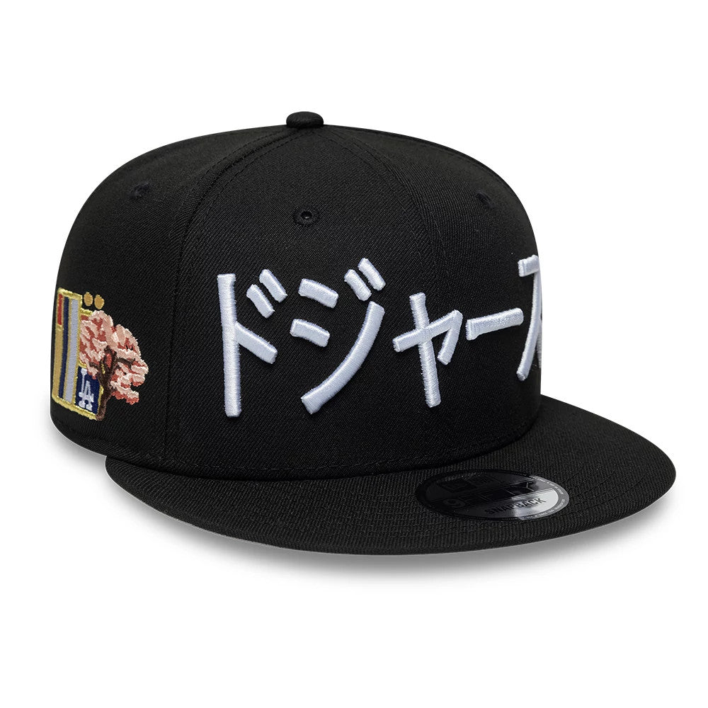 Pictured is this MLB Kanji LA Dodgers 9FIFTY Snapback Adjustable cap in black. 1