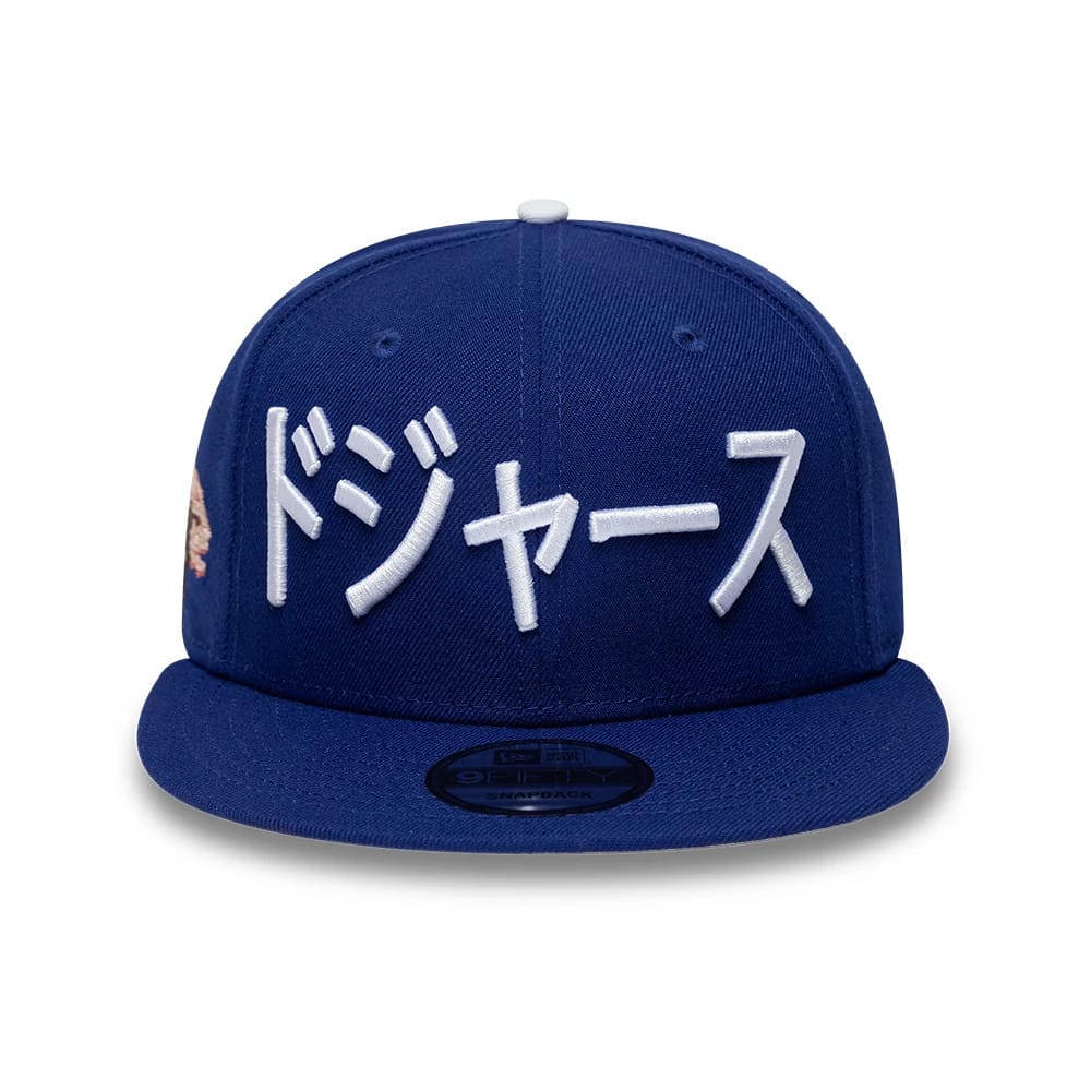 Pictured is this MLB Kanji LA Dodgers 9FIFTY Snapback Adjustable cap in dark blue. 3