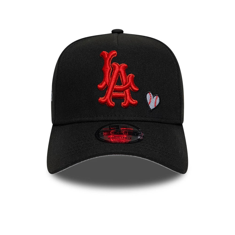 Pictured is this MLB Heart LA Angels 9FORTY A-Frame Adjustable cap in black. 3
