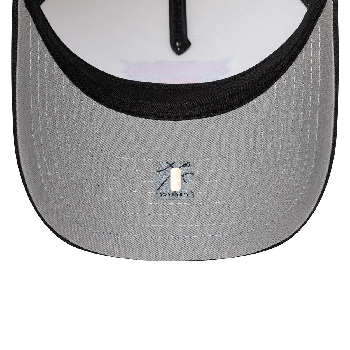 Pictured is this NBA New York Knicks 9FORTY A-Frame cap in white and black. 2