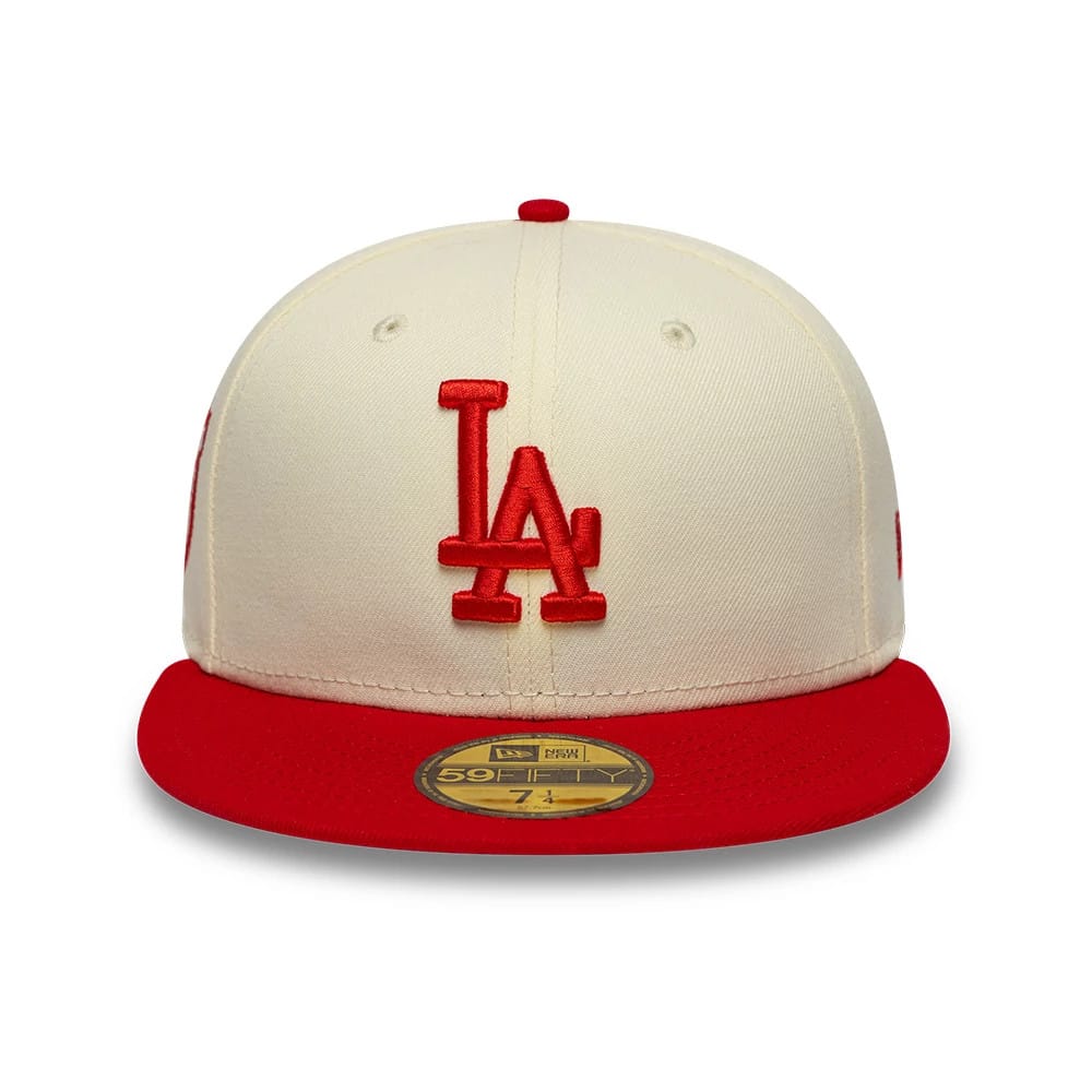 LA Dodgers MLB Chrome Scarlet Cream New Era 59FIFTY Fitted Cap, front view showing a raised red embroidered LA logo on the cream front panel, complemented by a red flat visor with a centred gold 59FIFTY size sticker, and a red top button.