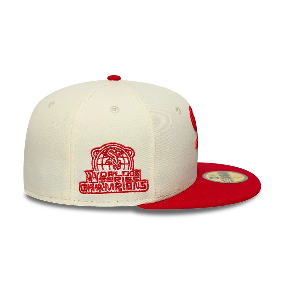 Chicago White Sox MLB Chrome Scarlet Cream New Era 59FIFTY Fitted Cap, rear view showing the red World Series Champions embroidered logo on the cream back panels, red top button, and contrasting red flat visor with a gold 59FIFTY size sticker.