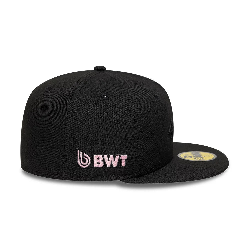 Alpine Racing Black New Era 59FIFTY Fitted Cap, side view showing the pink embroidered BWT logo on the side panel, a structured black crown with matching eyelets and top button, and a gold 59FIFTY size sticker on the flat black visor.