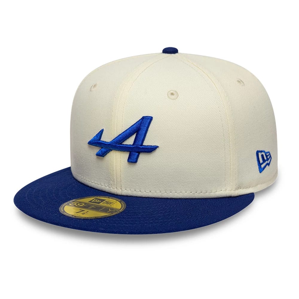 Alpine Racing Cream & Blue New Era 59FIFTY Fitted Cap, front view showing the blue embroidered A logo on the cream front panel, complemented by a blue flat visor and the New Era flag logo on the left side with a gold 59FIFTY size sticker.