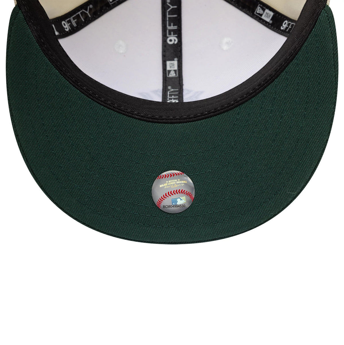 Pictured is this MLB New York Yankees 9FIFTY Snapback cap in cream and dark green. 7