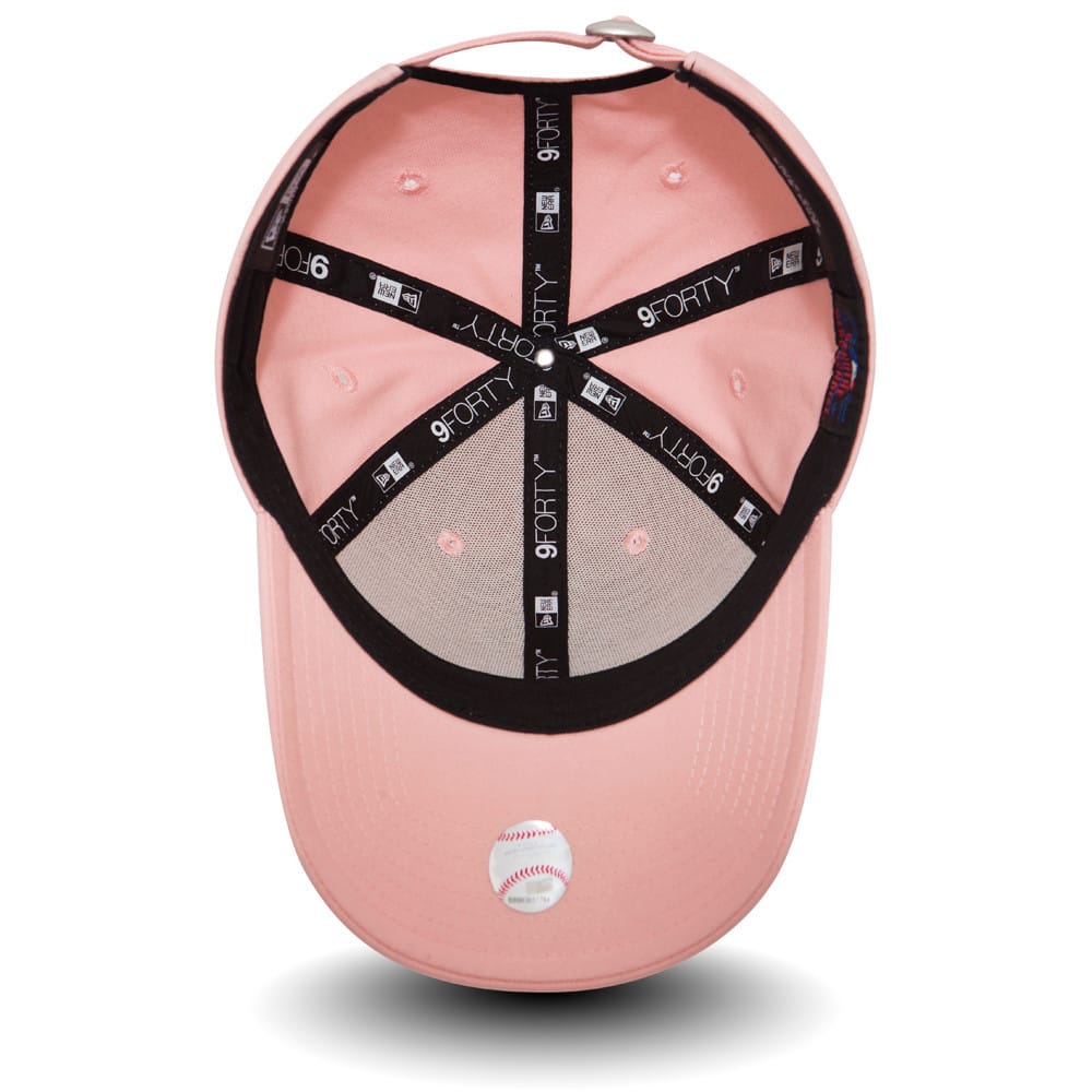 New York Yankees Essential Womens Pink New Era 9FORTY Cap, inside view showing the grey undervisor with a baseball graphic sticker, black taping with repeated 9FORTY logos, and a soft pink sweatband contrasting against the cap's pink interior.
