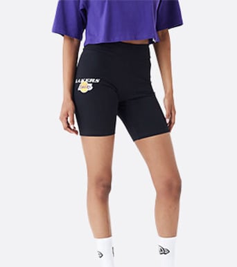 black women's cycling shorts with la lakers logo on the left hip of the model