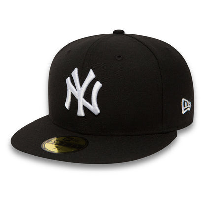 New York Yankees Essential Black New Era 59FIFTY Cap, three-quarter view showing a raised white embroidered NY logo on the front panel, a gold 59FIFTY size sticker on the visor, and the New Era flag logo on the left side.