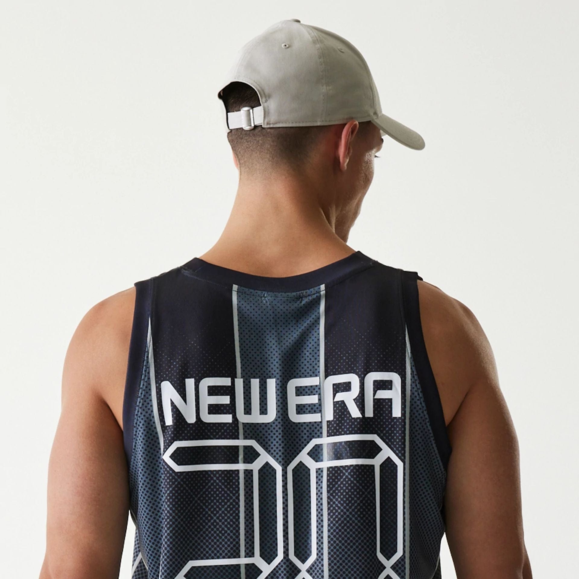 The Male model is wearing New Era City Sport Black Tank Top 7