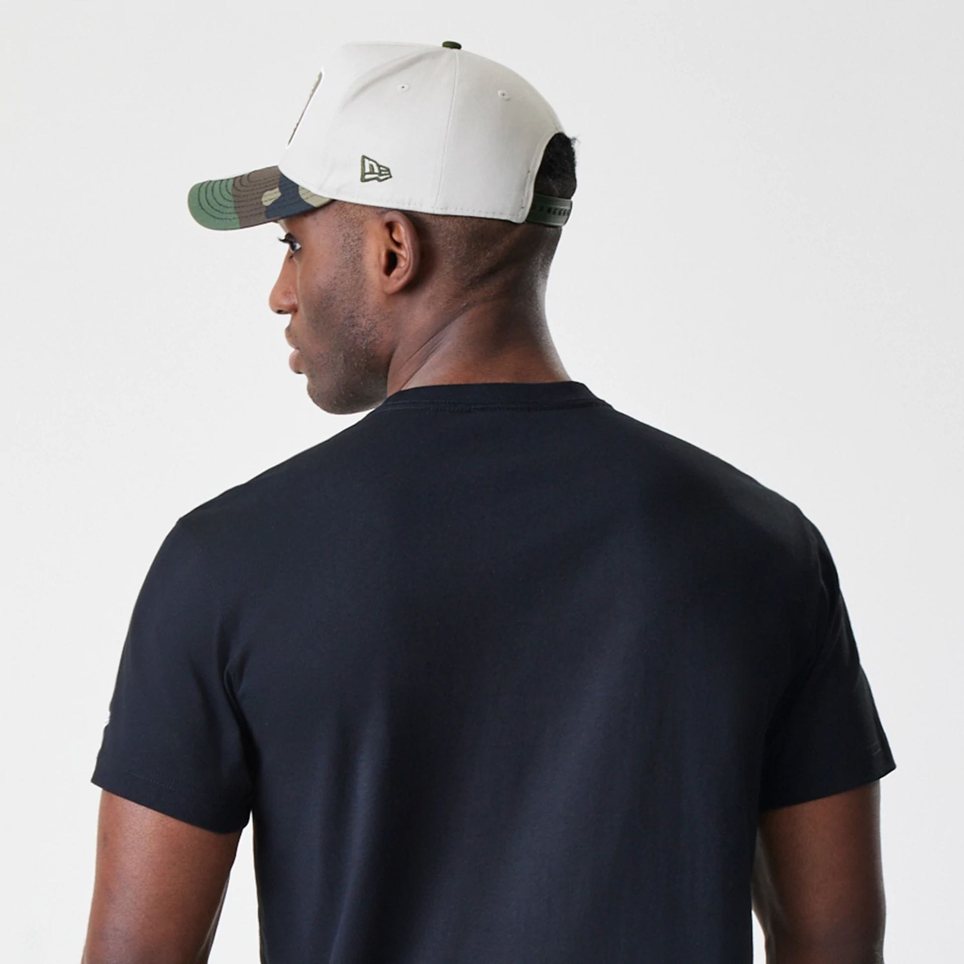 The Male model is wearing New Era Valentine's Day Black T-Shirt 4