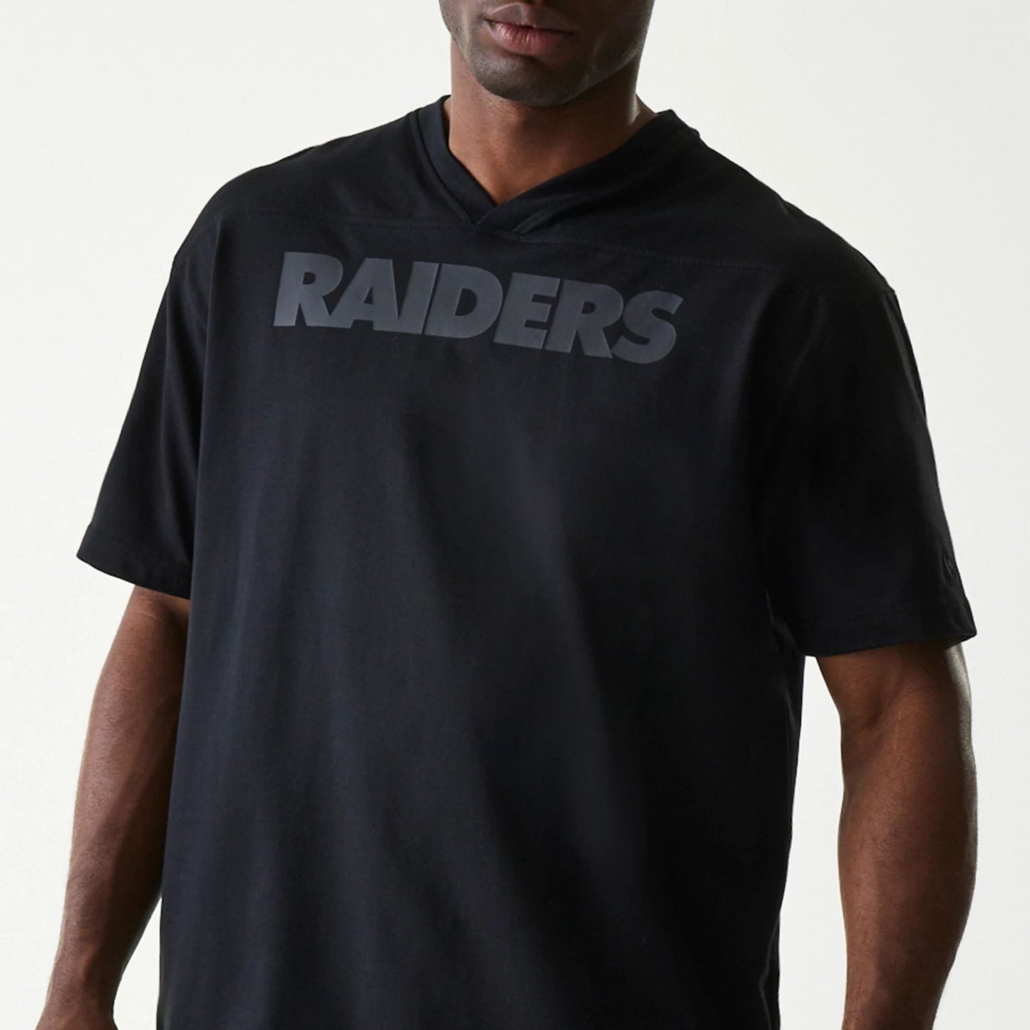 The Male model is wearing Las Vegas Raiders Tonal Pack Black T-Shirt 3