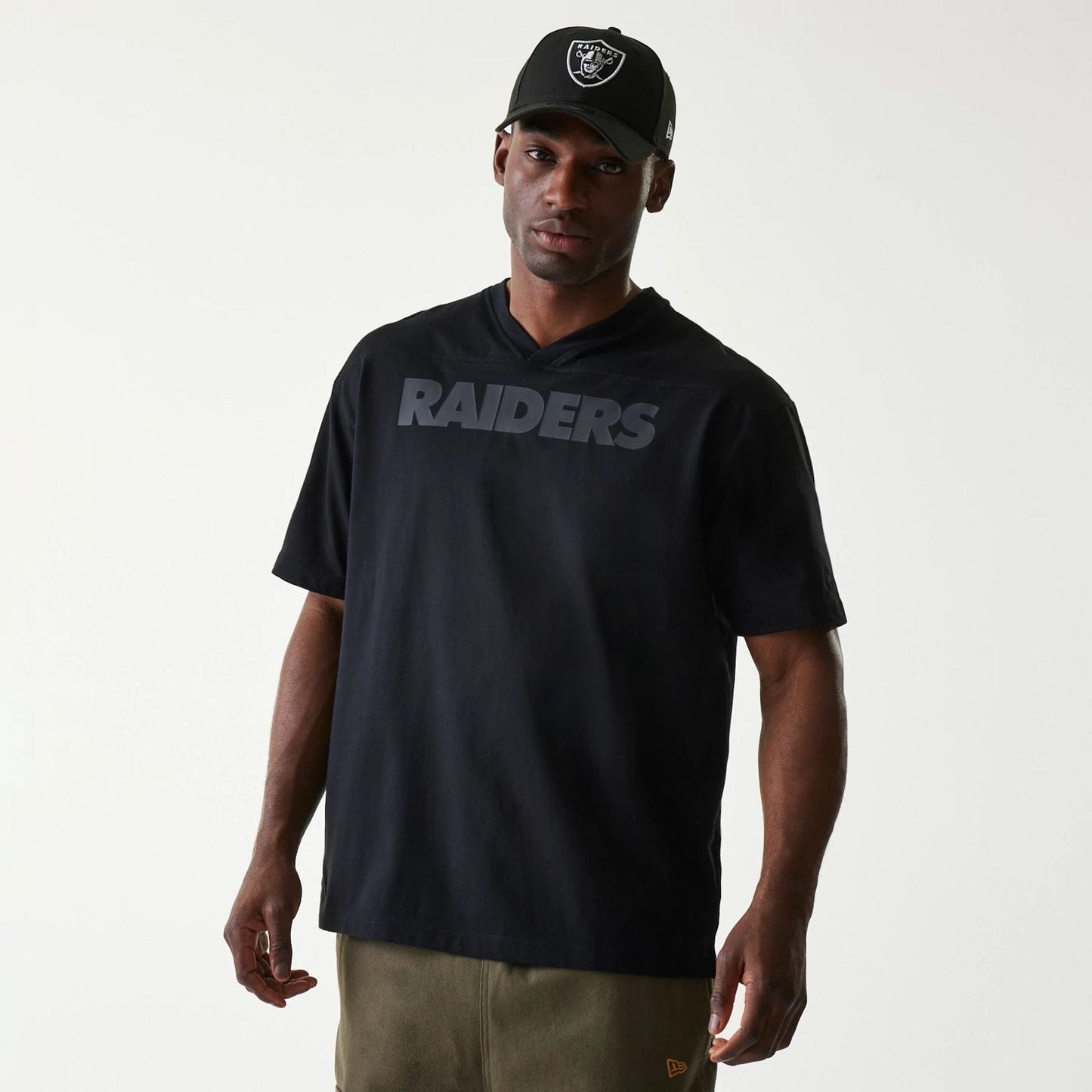 The Male model is wearing Las Vegas Raiders Tonal Pack Black T-Shirt 1