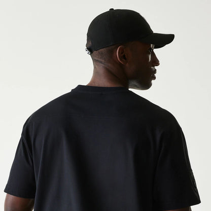 The Male model is wearing Las Vegas Raiders Tonal Pack Black T-Shirt 7