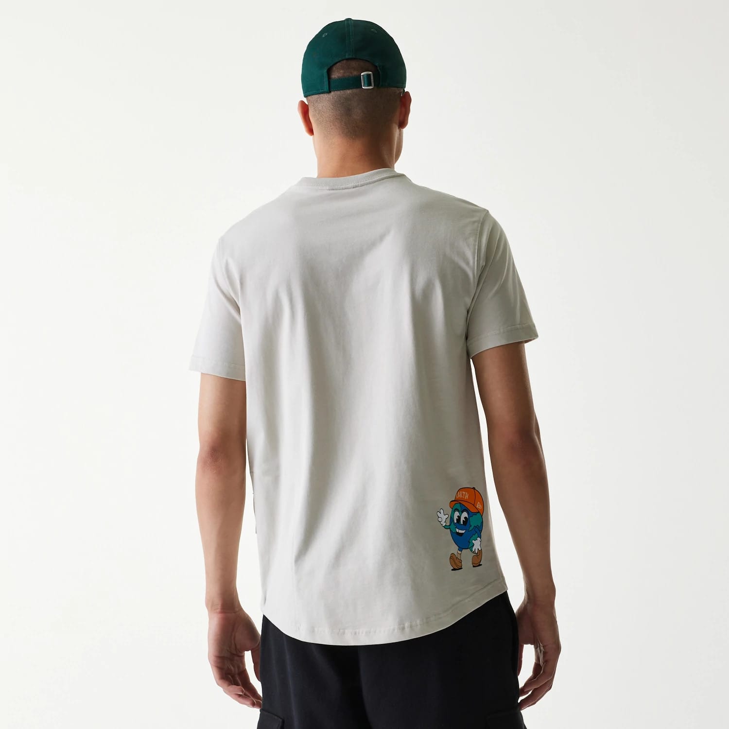 The Male model is wearing New Era Outdoor Earth Day Stone Side Pocket T-Shirt 2
